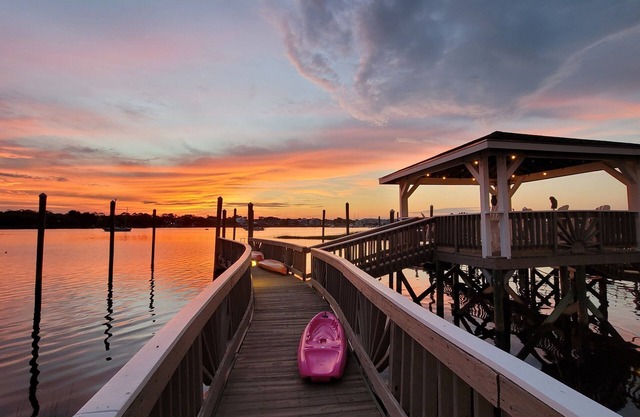 "All About the Views" is ON THE WATER - one block walk to the Beach Side!