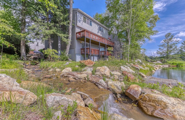 Large, contemporary condo w/ open living area, pond views & close to tennis!