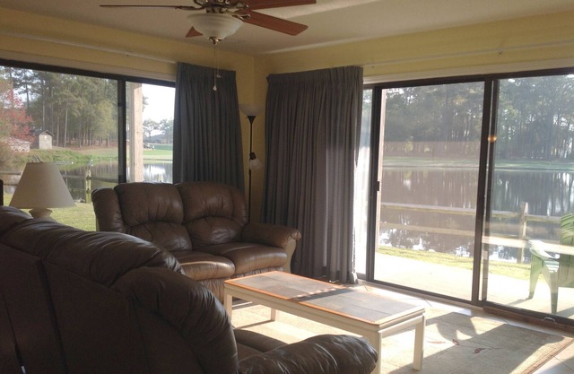 Spacious, First Floor Corner Unit, brings outdoors in w/ magnificent pond view!