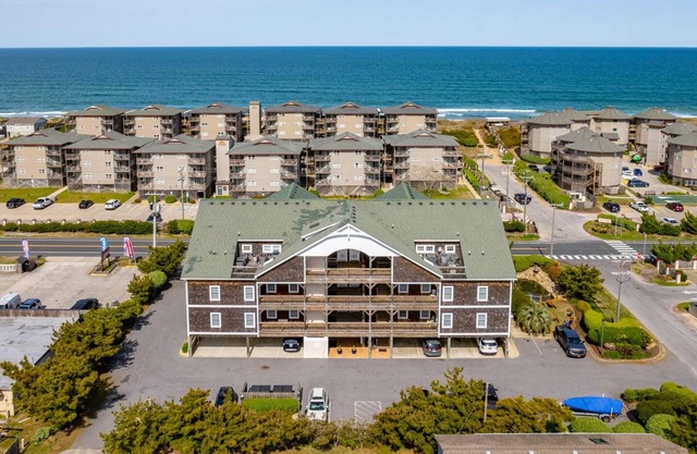 T's Retreat: Semi-oceanfront, third floor condo, two beach accesses close by.