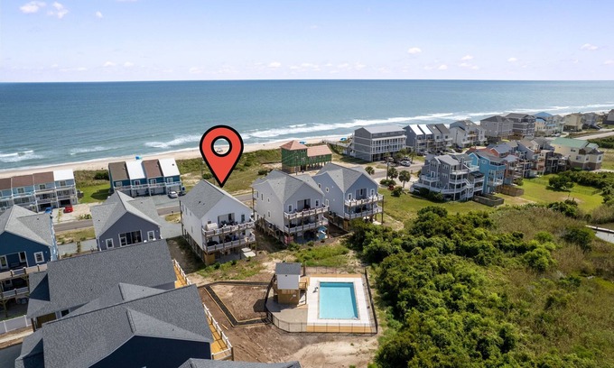McCutcheon Field House | Beachfront Escape | Pool, Hot Tub, Sauna, Fire Pit & EV Charger | Infinity Table