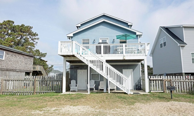 Colington Harbour House | CH113- Beautiful 3 BR on Canal- Stunning Interiors- Sunset Views- Fire Pit!