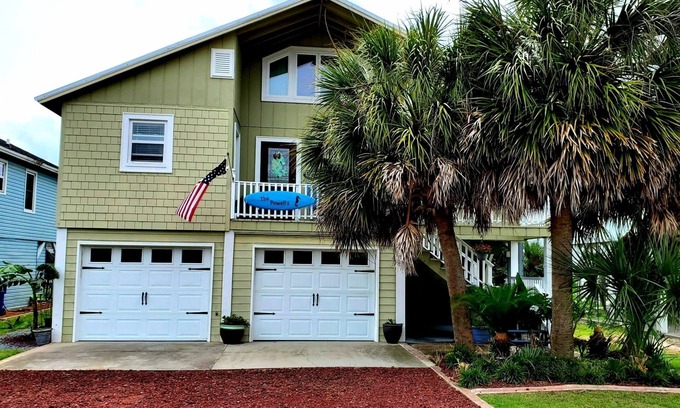 Ocean Isle Beach House | Charming Coastal Cottage On A Canal with Private Heated Pool, Tiki Bar and Dock