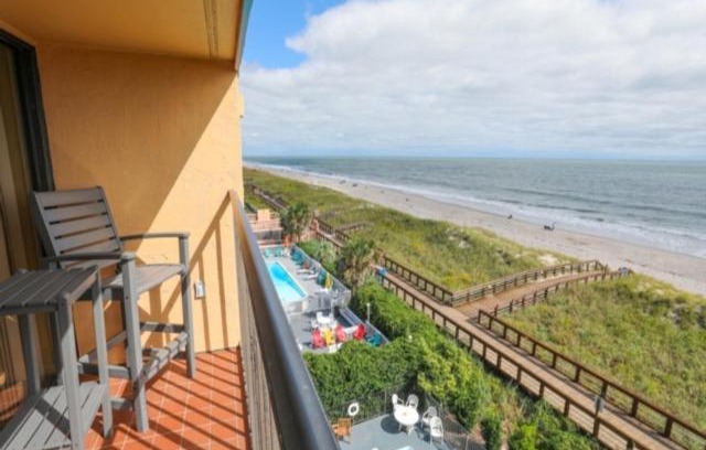 Carolina Beach Apartment | Coastal Cabana - Enjoy the gorgeous oceanfront sunrise from your 4th floor balcony, Walk to the Carolina Beach Boardwalk condo