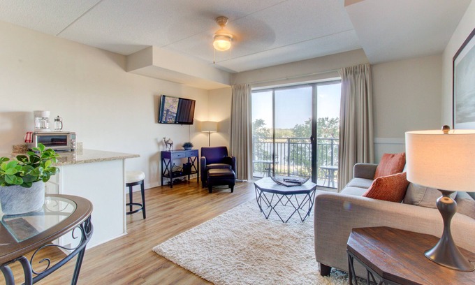 Wilmington Historic District Condo | Downtown condo w/balcony view of Cape Fear River & Battleship North Carolina