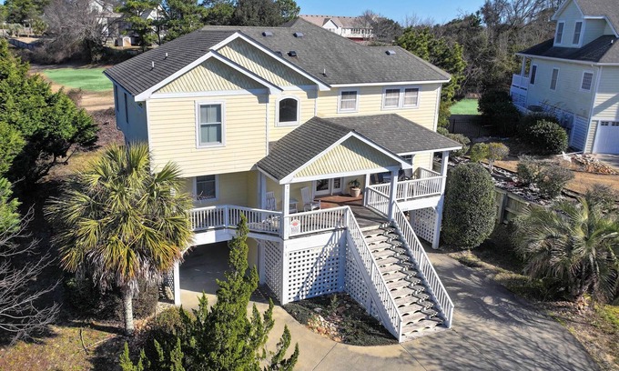 Sea Scape House | K0029 Show Boat scenic rental with pool, hot tub, and golf course views