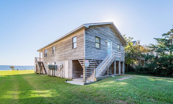 Colington Harbour House | K1557 Sounds Good. Waterfront perfect for your kayak & SUP, dogs welcome!