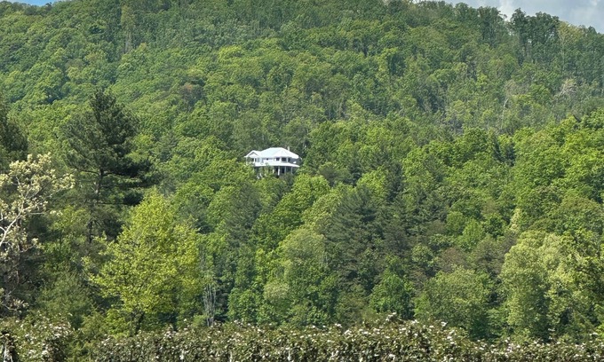 Hendersonville House | Mountain View’s, dual water fall Koi pond and private theater.