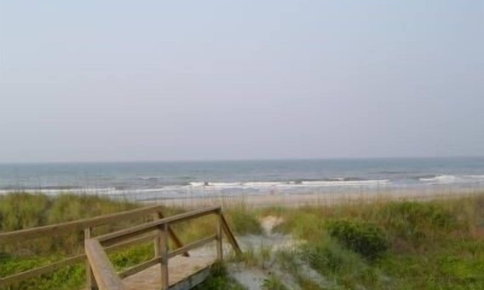 Morehead City Condo | Ocean-side condominium with pool. Fully-equipped for relaxed vacationing.