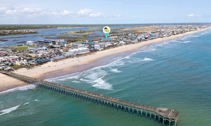 Surf City Condo | Oceanview condo located within walking distance to the beach!