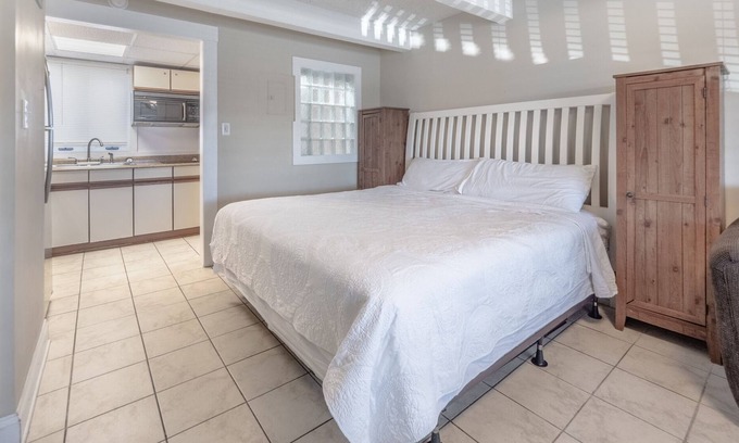 Airlie Condo | The Waterway 227: King + FSS Studio with complex pool