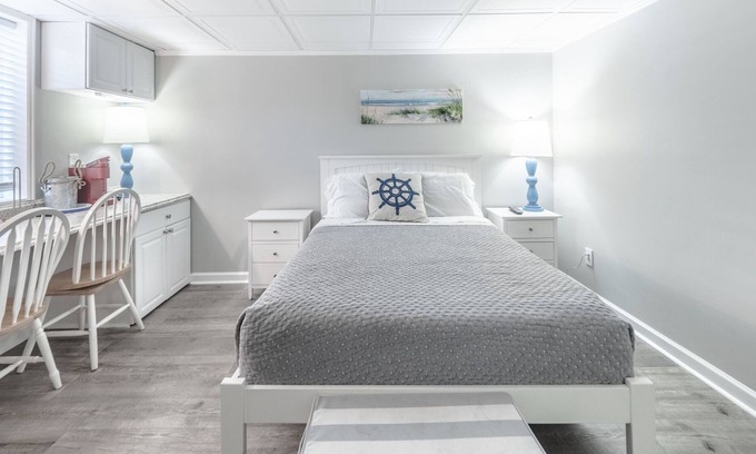 Airlie Condo | The Waterway 406: 1 Queen Bed Studio with complex pool