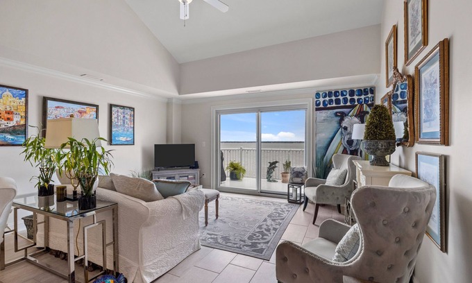Indian Beach Condo | Waterfront condo with balcony, grill, washer/dryer, AC, pool, game room, & gym