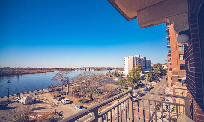Downtown Wilmington Apartment | WSR-12 Riverfront balcony views.