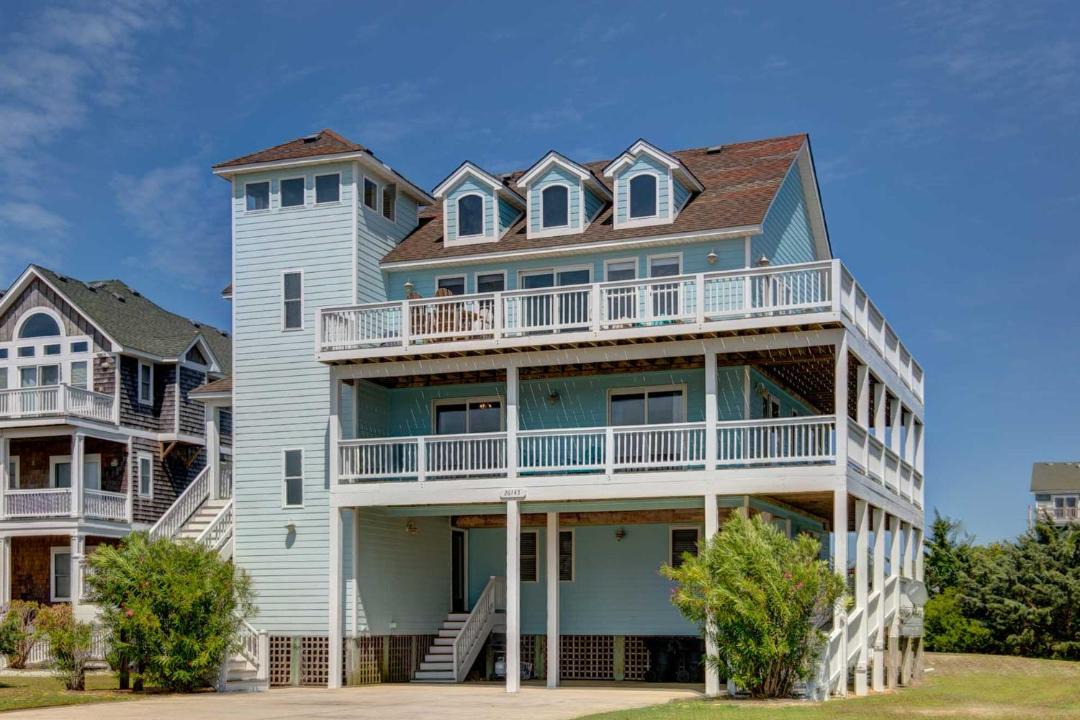 Photo of Buildings in Wind Over Waves