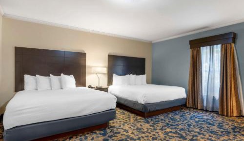 King Room with Two King Beds and Shower Only - Non-Smoking