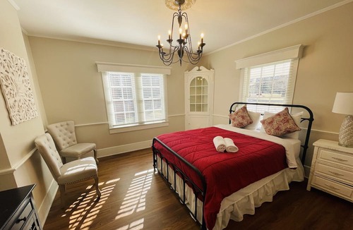 Clemmons House | Escape to serenity at our distinctive retreat, nestled behind the Excelsior at the Manor House