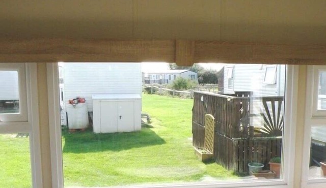 A small comfortable caravan, in a quiet location, with a lovely outside area to relax